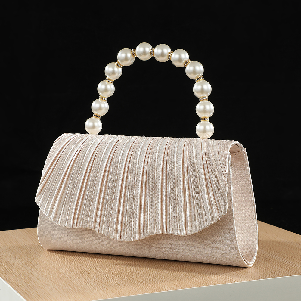 Women Handheld Bags - New fashionable pleated pearl hand-held evening
